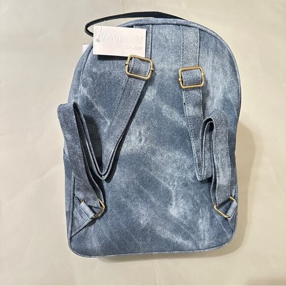 Vegan Quilted Denim Backpack – Gold Chain Accent | 100% Vegan-Friendly

⸻